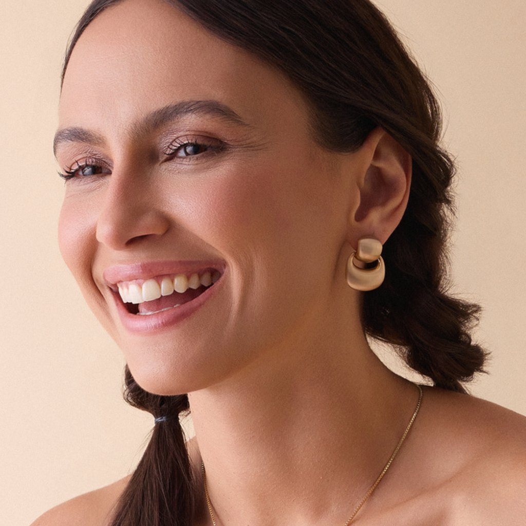 Model wearing GLOEN Geometric Matte earrings